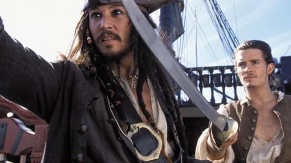Piráti z Karibiku Johnny Depp a Orlando Bloom